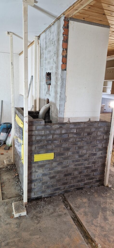 Inmurning av spiskassett med ventiler på sidorna för ökad värmeåtergivning